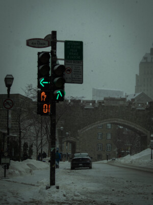 Snowy Crosswalk Image of a snowy crosswalk with focus on street lights