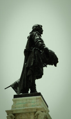 Image of a full-body statue from the side